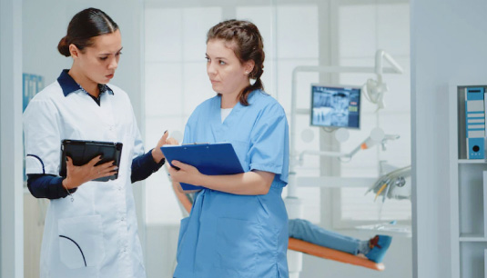 two ladies orthodontic assistants